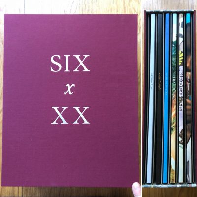 The photography book case cover for Six by XX by various artists. Includes Six books and Six signed photographs.