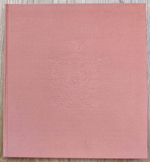 The photography book cover of Some Photos by Aaron Ruell. Hardback in coral. Signed.