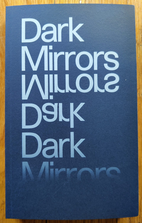 The photography book cover of Dark Mirrors by Stanley Wolukau Wanambwa.