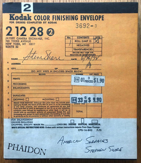 The photography book cover of American Surfaces by Stephen Shore. Paperback cover resembling Kodak envelope. Signed.