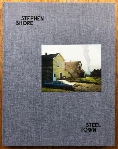 The photography book cover of Steel Town by Stephen Shore. Hardback in grey. 