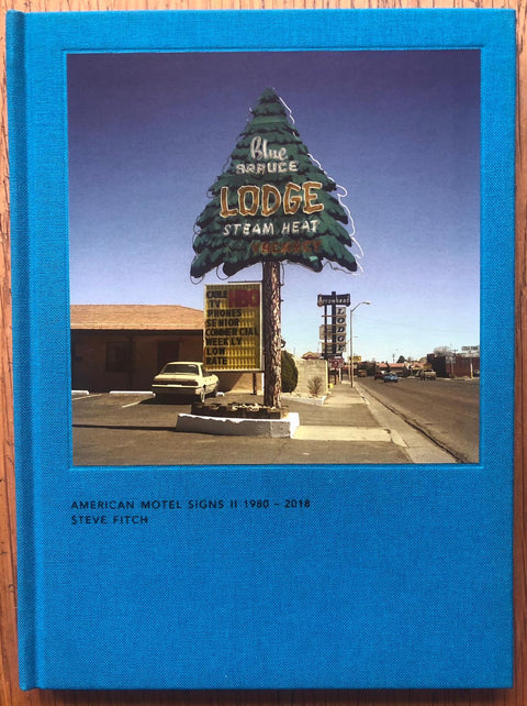 The photography book cover of American Motel Signs II 1980 - 2018 by Steve Fitch. Hardback in blue.