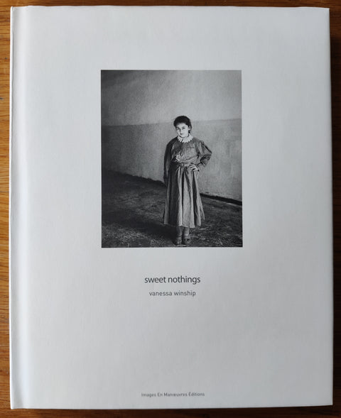 The photography book cover of Sweet Nothings by Vanessa Winship. In dust jacketed hardcover white.