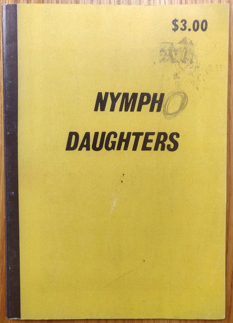 The photography book cover of Nymph Daughters by Todd Hido. Paperback in yellow with black edge and text. "$3.00" mark in the top right corner.