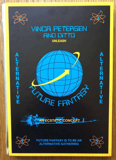 The photobook cover of Future Fantasy by Vinca Petersen. Hardback with sci-fi esque cover in yellow, black and blue. Signed.