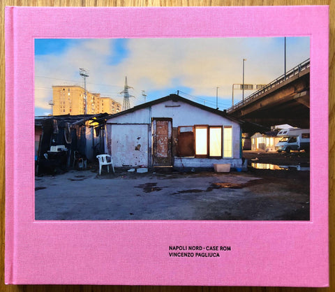 The photography book cover of Napoli Nord • Case Rom by Vincenzo Pagliuca. Hardback in pink.