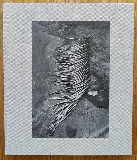 The photobook cover of Pikin Slee by Viviane Sassen. In hardcover grey.