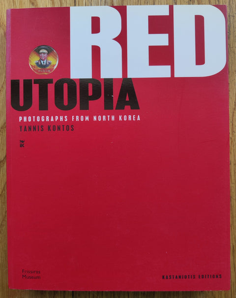The photography book cover of Red Utopia by Yannis Kontos. Paperback in red.
