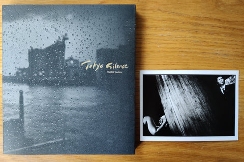 The photography book cover of Tokyo Silence - Special Edition (3 Print Options) by Yasuhiro Ogawa. In dust jacketed hardcover. Signed book plus a signed print.
