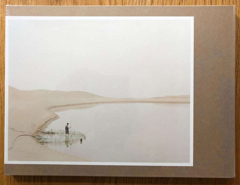 The photography book cover of The Yellow River by Zhang Kechun. Hardback with photograph of the yellow river. Signed.